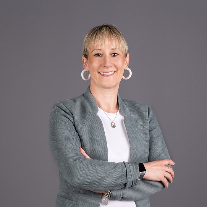 Porträt von Christoph Stetter, lächelnd, in professioneller Kleidung, für die Kontaktseite.